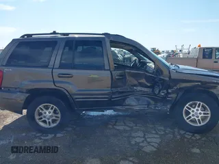 1999 Jeep Grand Cherokee Limited with VIN 1J4GW68N5XC773100, listed as a IAAI auction lot 41998432 with Not provided miles and . Bid and sale history available at DreamBid. Image 12.