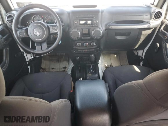 2016 Jeep Wrangler Unlimited Sport with VIN 1C4BJWDG4GL235252, listed as a Copart auction lot 54218885 with 118,849 mi miles and Salvage Title. Bid and sale history available at DreamBid. Image 8.