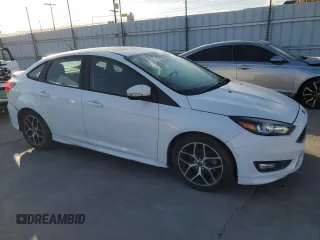 2016 Ford Focus SE with VIN 1FADP3F26GL336032, listed as a Copart auction lot 55963715 with 107,527 mi miles and Clean title. Bid and sale history available at DreamBid. Image 4.