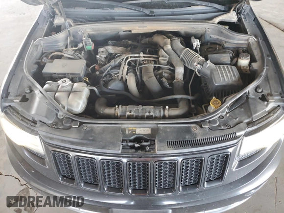 2014 Jeep Grand Cherokee с VIN 1C4RJEJM8EC424373, выставлен на аукционе Copart как лот 72256674 с пробегом 128 998 миль миль и Списание • Salvage title. История ставок и продаж доступна на DreamBid. Изображение 11.