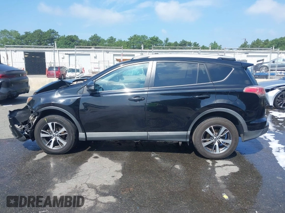 2016 Toyota RAV4 XLE with VIN 2T3RFREV9GW458057, listed as a IAAI auction lot 42651373 with 119,750 mi miles and . Bid and sale history available at DreamBid. Image 14.