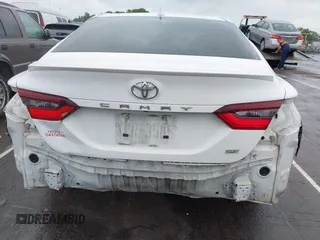 2023 Toyota Camry SE z VIN 4T1G11AK4PU738724, wystawiony jako IAAI lot #42123044 z przebiegiem 58 659 mil mil oraz . Historia ofert i sprzedaży dostępna na DreamBid. Obrazek 16.