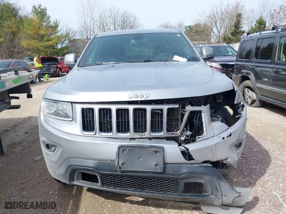 2014 Jeep Grand Cherokee Laredo with VIN 1C4RJFAG7EC243121, listed as a IAAI auction lot 41925695 with 147,999 mi miles. Bid and sale history available at carsss.com. Image 12.
