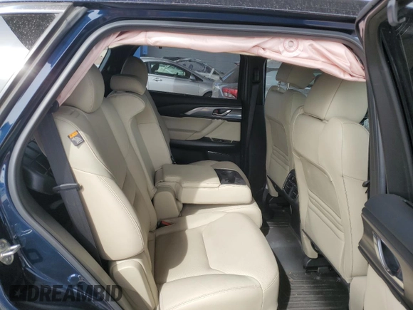 2018 Mazda CX-9 Grand Touring z VIN JM3TCADY2J0220873, wystawiony jako Copart lot #49264875 z przebiegiem Nie podano mil oraz Szkoda całkowita • Salvage title. Historia ofert i sprzedaży dostępna na DreamBid. Obrazek 10.