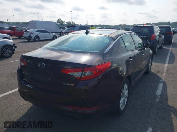 2012 Kia Optima EX with VIN 5XXGN4A65CG006101, listed as a IAAI auction lot 39989235 with 75,995 mi miles and . Bid and sale history available at carsss.com. Image 4.