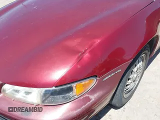 2000 Pontiac Grand Prix SE with VIN 1G2WJ52K3YF262773, listed as a IAAI auction lot 42031719 with 164,284 mi miles. Bid and sale history available at carsss.com. Image 6.