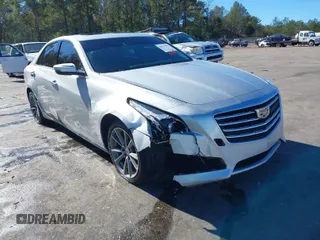 2017 Cadillac CTS Luxury RWD with VIN 1G6AR5SS4H0186842, listed as a IAAI auction lot 40931575 with 166,377 mi miles and . Bid and sale history available at DreamBid. Image 1.