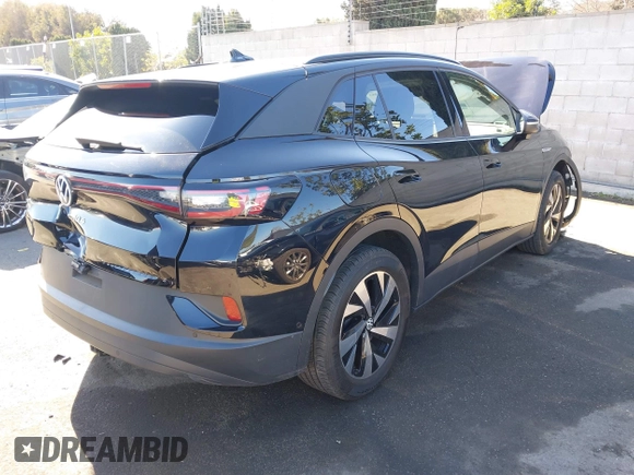 2023 Volkswagen ID.4 Pro z VIN 1V2DNPE85PC028748, wystawiony jako IAAI lot #41348983 z przebiegiem 7 434 mil mil oraz . Historia ofert i sprzedaży dostępna na DreamBid. Obrazek 4.