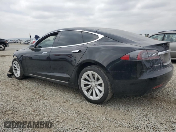2019 Tesla Model S 75D with VIN 5YJSA1E25KF299740, listed as a Copart auction lot 55821595 with 140,385 mi miles and Salvage title. Bid and sale history available at DreamBid. Image 2.