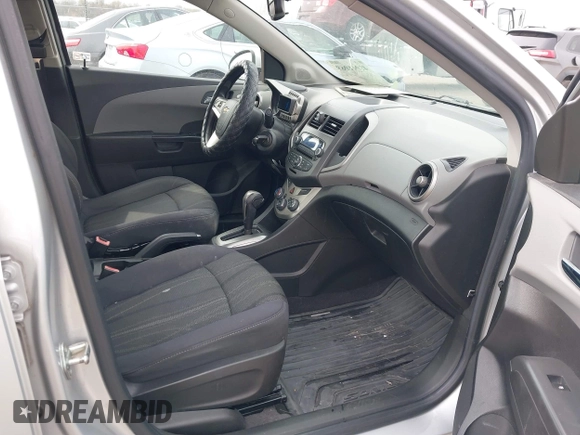 2012 Chevrolet Sonic LT with VIN 1G1JC5SHXC4170853, listed as a IAAI auction lot 41941069 with 130,917 mi miles and . Bid and sale history available at DreamBid. Image 5.