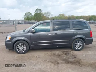 2015 Chrysler Town & Country Touring L with VIN 2C4RC1CG9FR646214, listed as a IAAI auction lot 42202486 with 184,555 mi miles and . Bid and sale history available at carsss.com. Image 14.