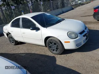 2004 Dodge Neon SXT with VIN 1B3ES56C34D601823, listed as a IAAI auction lot 41755978 with 209,042 mi miles. Bid and sale history available at carsss.com. Image 1.
