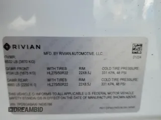 2024 Rivian R1S Adventure z VIN 7PDSGABAXRN035766, wystawiony jako Copart lot #77481034 z przebiegiem 6 590 mil mil oraz Szkoda całkowita • Salvage title. Historia ofert i sprzedaży dostępna na DreamBid. Obrazek 15.