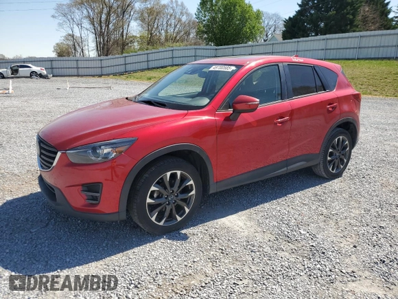 2016 Mazda CX-5 Grand Touring z VIN JM3KE2DYXG0840777, wystawiony jako Copart lot #49700585 z przebiegiem 116 469 mil mil oraz Szkoda całkowita • Salvage title. Historia ofert i sprzedaży dostępna na DreamBid. Obrazek 1.