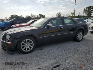 2005 Chrysler 300 C with VIN 2C3AA63H15H525775, listed as a Copart auction lot 52018135 with 59,098 mi miles and Salvage Title. Bid and sale history available at DreamBid. Image 1.