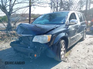 2009 Chrysler Town & Country Touring with VIN 2A8HR54X39R629941, listed as a IAAI auction lot 41525899 with 151,803 mi miles and . Bid and sale history available at DreamBid. Image 2.