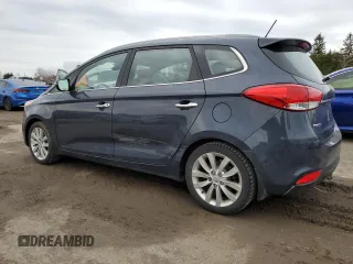2014 Kia Rondo EX with VIN KNAHU8A39E7037977, listed as a Copart auction lot 51824125 with 292,042 mi miles and Clean Title. Bid and sale history available at carsss.com. Image 2.