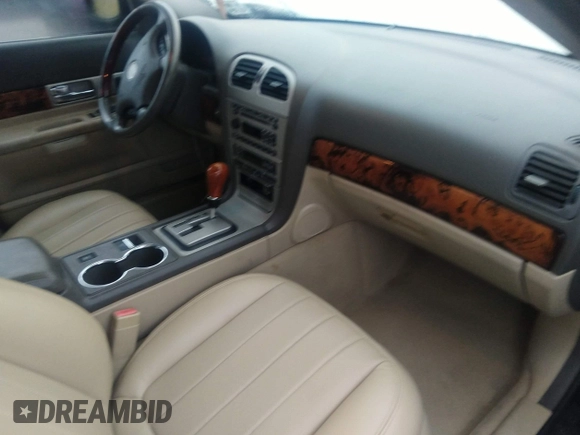 2005 Lincoln LS w/Luxury Pkg with VIN 1LNHM86S85Y606813, listed as a IAAI auction lot 39938974 with 131,558 mi miles. Bid and sale history available at carsss.com. Image 5.