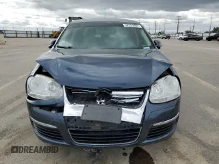 2010 Volkswagen Jetta Limited Edition with VIN 3VWRZ7AJ0AM099928, listed as a Copart auction lot 57291895 with 118,451 mi miles and Salvage title. Bid and sale history available at DreamBid. Image 5.