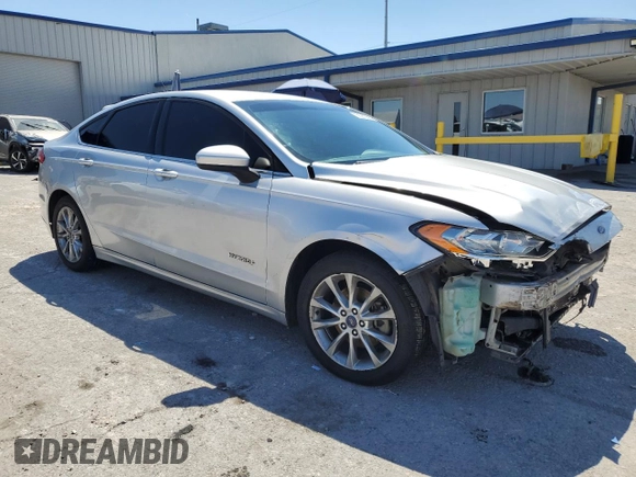 2017 Ford Fusion Hybrid SE with VIN 3FA6P0LUXHR266132, listed as a Copart auction lot 56255565 with 182,458 mi miles and Salvage title. Bid and sale history available at DreamBid. Image 4.