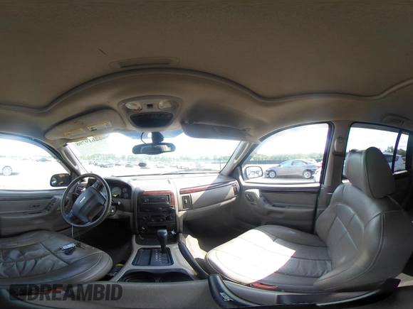 2004 Jeep Grand Cherokee Limited with VIN 1J4GX58SX4C255363, listed as a IAAI auction lot 42619798 with 239,475 mi miles and . Bid and sale history available at DreamBid. Image 18.