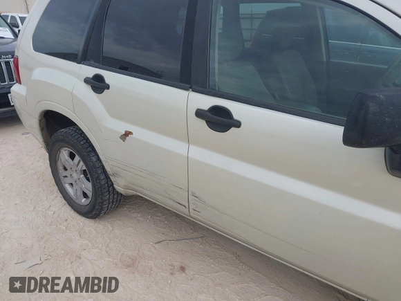 2008 Mitsubishi Endeavor LS with VIN 4A4MN21S78E035818, listed as a IAAI auction lot 41025955 with 219,163 mi miles. Bid and sale history available at carsss.com. Image 6.