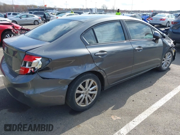 2012 Honda Civic EX-L with VIN 2HGFB2F94CH307646, listed as a IAAI auction lot 42006923 with 260,917 mi miles and . Bid and sale history available at DreamBid. Image 4.