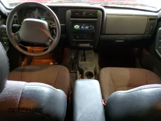 2001 Jeep Cherokee Sport with VIN 1J4FF58S01L519670, listed as a Copart auction lot 84340454 with 132,584 mi miles and Clean title. Bid and sale history available at DreamBid. Image 8.