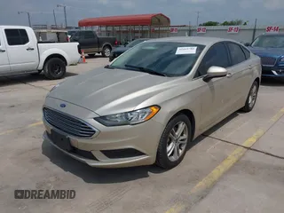 2018 Ford Fusion SE z VIN 3FA6P0H75JR176394, wystawiony jako IAAI lot #42169780 z przebiegiem 65 617 mil mil oraz . Historia ofert i sprzedaży dostępna na DreamBid. Obrazek 18.