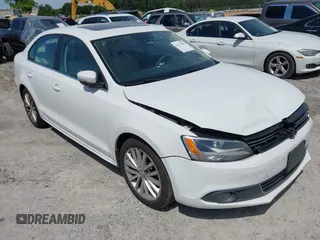 2013 Volkswagen Jetta TDI w/Premium/Nav z VIN 3VWLL7AJ2DM203802, wystawiony jako IAAI lot #42311963 z przebiegiem 136 099 mil mil oraz . Historia ofert i sprzedaży dostępna na DreamBid. Obrazek 1.