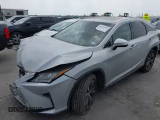 2017 Lexus RX 350 z VIN 2T2ZZMCAXHC052984, wystawiony jako IAAI lot #42273947 z przebiegiem 128 019 mil mil oraz . Historia ofert i sprzedaży dostępna na DreamBid. Obrazek 2.