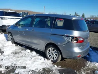 2014 Mazda 5 Sport with VIN JM1CW2BLXE0168119, listed as a IAAI auction lot 41527688 with 142,357 mi miles and . Bid and sale history available at DreamBid. Image 3.