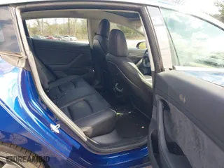 2018 Tesla Model 3 Long Range Battery with VIN 5YJ3E1EA2JF038435, listed as a IAAI auction lot 41541024 with 65667 miles. Bid and sale history available at carsss.com. Image 8.