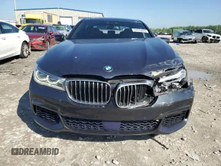 2016 BMW 7 Series 750i xDrive с VIN WBA7F2C56GG417976, выставлен на аукционе Copart как лот 55976095 с пробегом 113 753 миль миль и Списание • Salvage title. История ставок и продаж доступна на DreamBid. Изображение 5.