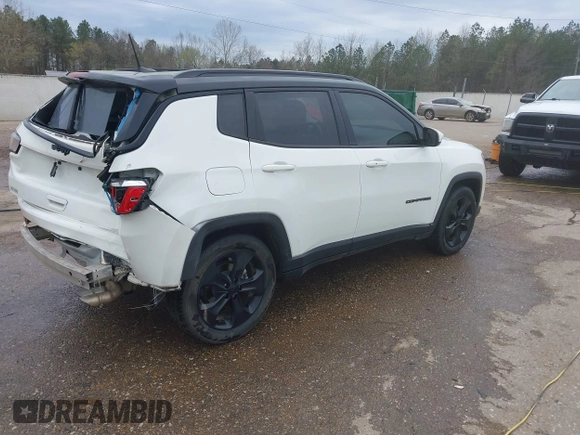 2020 Jeep Compass Latitude with VIN 3C4NJCBB9LT118042, listed as a IAAI auction lot 41811634 with 62,717 mi miles and . Bid and sale history available at carsss.com. Image 4.