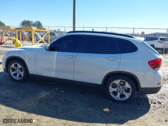 2015 BMW X1 sDrive28i with VIN WBAVM1C53FV317173, listed as a IAAI auction lot 41586385 with 146,068 mi miles. Bid and sale history available at carsss.com. Image 14.