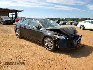 2016 Ford Fusion Titanium z VIN 3FA6P0K98GR151640, wystawiony jako Copart lot #73254594 z przebiegiem 145 473 mil mil oraz Szkoda całkowita • Salvage title. Historia ofert i sprzedaży dostępna na DreamBid. Obrazek 11.