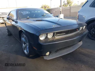 2014 Dodge Challenger R/T with VIN 2C3CDYBT7EH225532, listed as a IAAI auction lot 42471839 with 184,543 mi miles and . Bid and sale history available at DreamBid. Image 1.