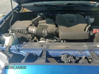2018 Toyota Tacoma SR5 with VIN 5TFAZ5CN0JX058391, listed as a Copart auction lot 80150825 with 76,948 mi miles and Salvage title. Bid and sale history available at DreamBid. Image 15.