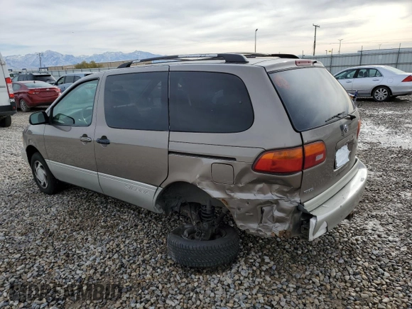 1999 Toyota Sienna LE with VIN 4T3ZF13C7XU133135, listed as a Copart auction lot 80618034 with 200,910 mi miles and Salvage Title. Bid and sale history available at carsss.com. Image 2.
