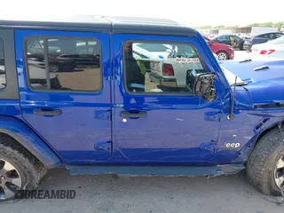 2018 Jeep Wrangler Unlimited Sahara z VIN 1C4HJXEN4JW321227, wystawiony jako IAAI lot #42002735 z przebiegiem 114 293 mil mil oraz . Historia ofert i sprzedaży dostępna na DreamBid. Obrazek 13.