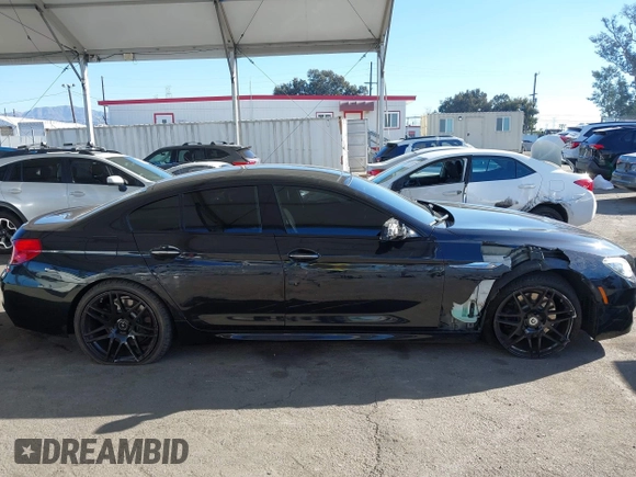 2015 BMW 6 Series 640i with VIN WBA6A0C52FGB53591, listed as a IAAI auction lot 41247695 with 81,828 mi miles and . Bid and sale history available at DreamBid. Image 13.