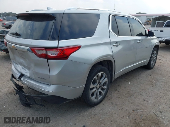 2021 Chevrolet Traverse Premier with VIN 1GNEVKKW9MJ213346, listed as a IAAI auction lot 41591024 with 112,803 mi miles. Bid and sale history available at carsss.com. Image 4.