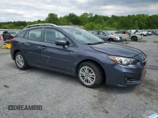2017 Subaru Impreza Premium with VIN 4S3GTAD61H3711128, listed as a Copart auction lot 58942425 with 127,890 mi miles and Salvage title. Bid and sale history available at DreamBid. Image 4.