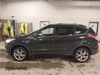 2013 Ford Escape SEL with VIN 1FMCU9H96DUC64584, listed as a IAAI auction lot 41357053 with 139,422 mi miles. Bid and sale history available at carsss.com. Image 14.