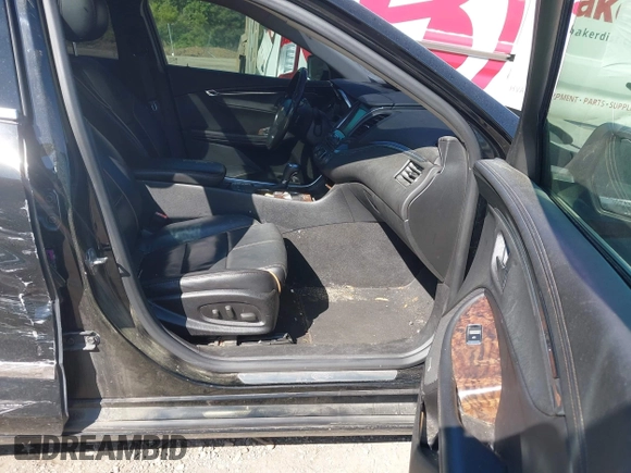 2014 Chevrolet Impala LTZ with VIN 1G1155S30EU121744, listed as a IAAI auction lot 41990517 with 140,573 mi miles and . Bid and sale history available at DreamBid. Image 5.