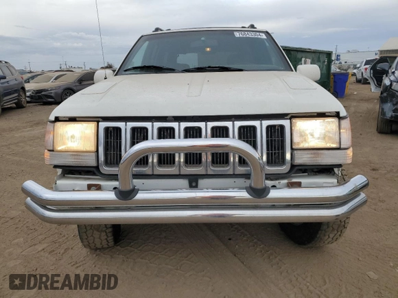 1998 Jeep Grand Cherokee Limited with VIN 1J4GZ88Z4WC164505, listed as a Copart auction lot 76843304 with 0 mi miles and Salvage Title. Bid and sale history available at carsss.com. Image 5.