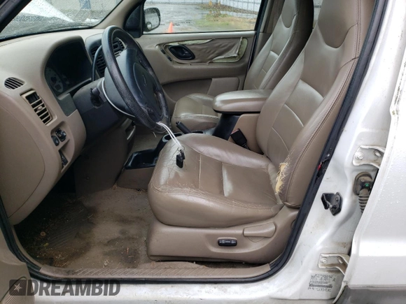 2001 Ford Escape XLT with VIN 1FMYU04181KC55393, listed as a Copart auction lot 76321074 with 223,327 mi miles and Salvage Title. Bid and sale history available at carsss.com. Image 7.