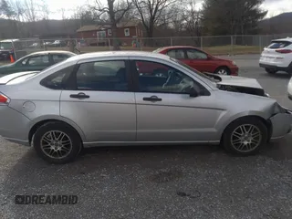 2011 Ford Focus SE with VIN 1FAHP3FN5BW129246, listed as a IAAI auction lot 41719759 with 144,867 mi miles and . Bid and sale history available at DreamBid. Image 14.