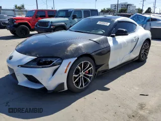 2021 Toyota Supra 3.0 с VIN WZ1DB0C09MW039777, выставлен на аукционе Copart как лот 66685035 с пробегом 43 956 миль миль и Списание • Salvage title. История ставок и продаж доступна на DreamBid. Изображение 1.